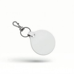 floating keychain mockup with a plain round tag, isolated on transparent background with soft drop shadow, 3D rendering style, designed for product preview or branding placement