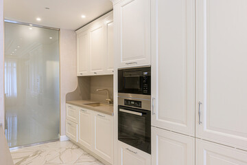 interior apartment kitchen and dining room, refectory area, cooking equipment, table furniture, stove