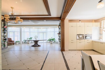 interior apartment kitchen and dining room, refectory area, cooking equipment, table furniture, stove