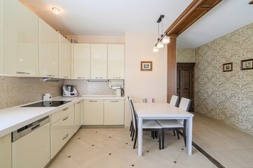 interior apartment kitchen and dining room, refectory area, cooking equipment, table furniture, stove