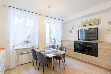 interior apartment kitchen and dining room, refectory area, cooking equipment, table furniture,...
