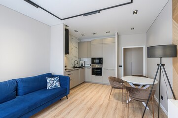 interior apartment kitchen and dining room, refectory area, cooking equipment, table furniture, stove