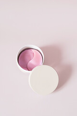 Pink Eye Patches in Jar with Lid. Under Eye Treatment and Skincare Product for Spa.
