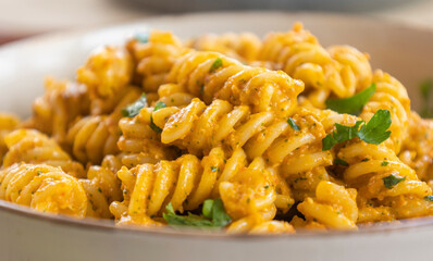  delicious and easy pasta dish with red bell pepper pesto, served as a comforting dinner