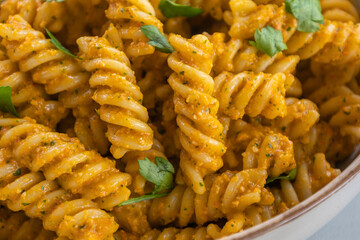  delicious and easy pasta dish with red bell pepper pesto, served as a comforting dinner
