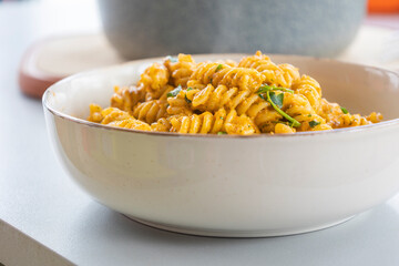  delicious and easy pasta dish with red bell pepper pesto, served as a comforting dinner