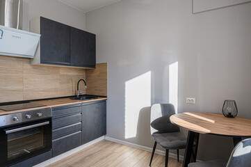 interior apartment kitchen and dining room, refectory area, cooking equipment, table furniture,...