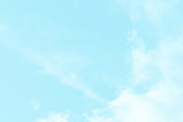 Blue pastel sky with white fluffy cloud. Cumulus clouds background. Cloudscape morning sky. The concepts of freedom of life, never give up and positive though energy.