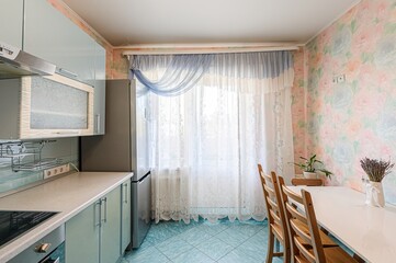 interior apartment kitchen and dining room, refectory area, cooking equipment, table furniture, stove