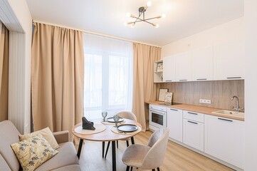 interior apartment kitchen and dining room, refectory area, cooking equipment, table furniture,...