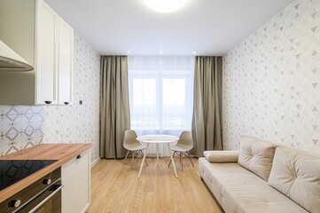 interior apartment kitchen and dining room, refectory area, cooking equipment, table furniture,...