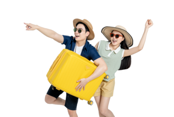 portrait of asian couple wearing travel clothes, carrying suitcases and posing on white background