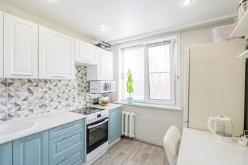 interior apartment kitchen and dining room, refectory area, cooking equipment, table furniture,...