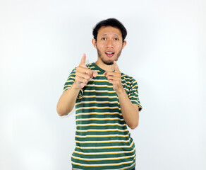 Man Pointing Fingers with Positive Expression on White Studio Background