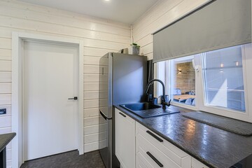 interior apartment kitchen and dining room, refectory area, cooking equipment, table furniture,...