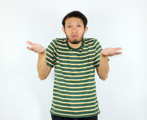 Man Shrugging Shoulders with Questioning Expression on Plain White Background
