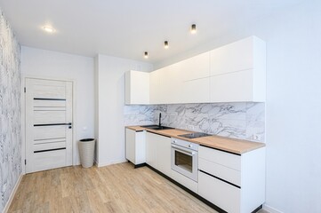 interior apartment kitchen and dining room, refectory area, cooking equipment, table furniture, stove