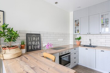 interior apartment kitchen and dining room, refectory area, cooking equipment, table furniture,...