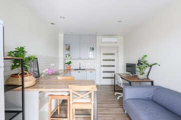 interior apartment kitchen and dining room, refectory area, cooking equipment, table furniture, stove