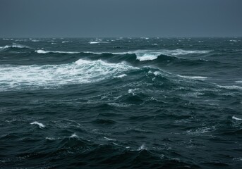 Fototapeta premium Deep Teal Ocean Waves Under Overcast Sky