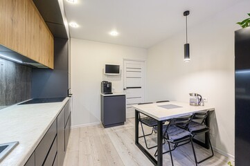 interior apartment kitchen and dining room, refectory area, cooking equipment, table furniture, stove