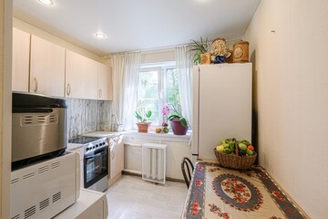 interior apartment kitchen and dining room, refectory area, cooking equipment, table furniture,...