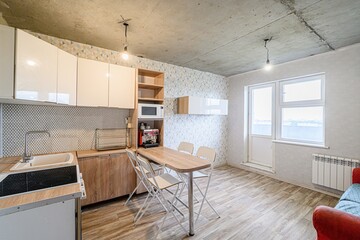 interior apartment kitchen and dining room, refectory area, cooking equipment, table furniture, stove