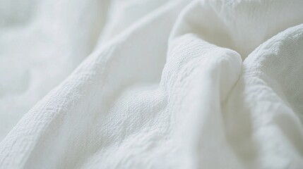 Close-up of a white mattress surface with detailed stitching and quilted texture