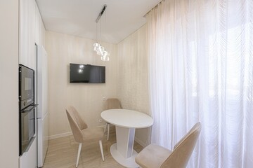interior apartment kitchen and dining room, refectory area, cooking equipment, table furniture, stove
