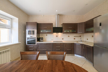 interior apartment kitchen and dining room, refectory area, cooking equipment, table furniture, stove