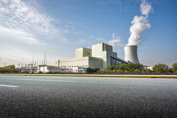 Modern Industrial Power Plant with Cooling Tower and Steam Emissions