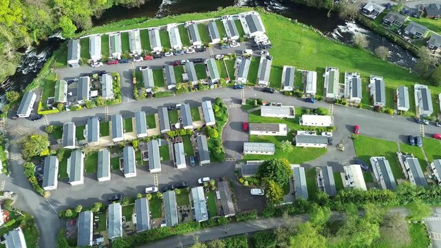 4K drone aerial of Glan Gwna side to top view of caravans, Caernarfon at Daytime, Wirral, UK
