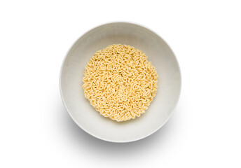 Uncooked instant noodles in white ceramic bowl isolated on white background, top view