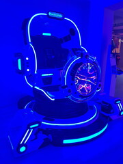 Dark blue virtual reality experience, amusement park lights, neon colors, evening