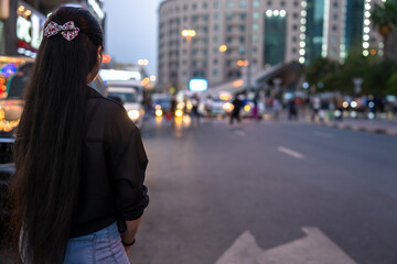 Girl Waiting Patiently for a Taxi