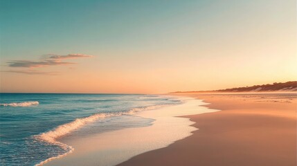 Serene ocean beach with gentle waves meeting sandy shore under pastel sunset sky