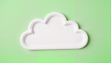 Abstract soft cotton cloud silhouette on pastel green background, natural softness