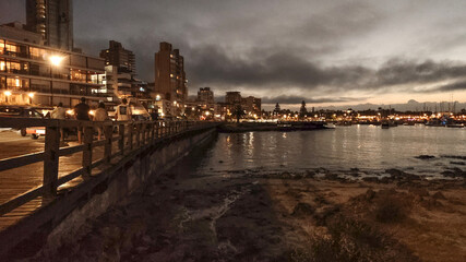 Urban night cityscape scene, punta del este city, uruguay