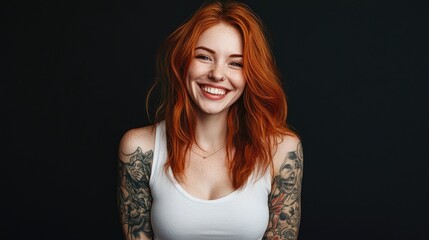 Naklejka premium A smiling woman with curly red hair and bangs stands against a light blue background.