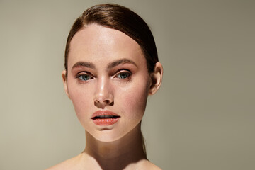 Beautiful young woman with radiant skin showcasing natural beauty in a serene setting