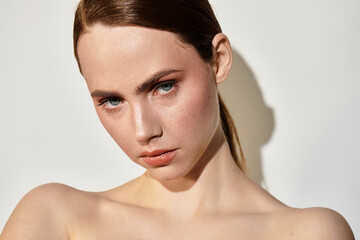 Capturing the elegance and strength of a young woman illuminated by soft natural light