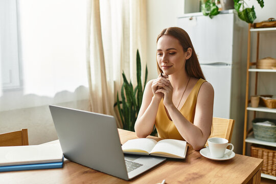 Young woman engaged in creative work at cozy home studio with warm natural light