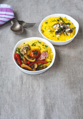 Homemade dishes with corn porridge and grilled vegetables. Traditional Italian polenta with vegetables. Healthy food for every day for vegans.
