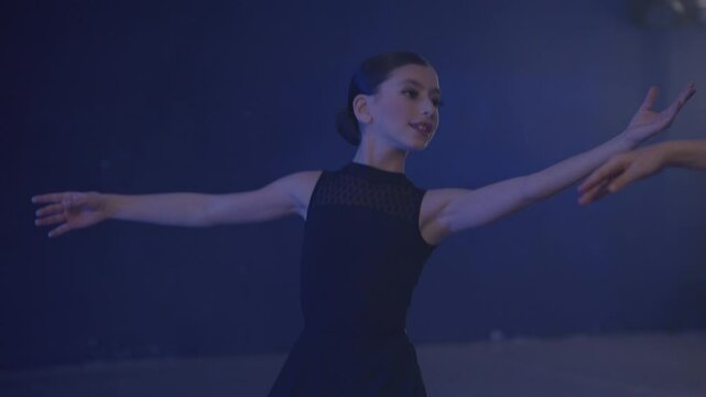 Young girls in dance class performing incredibly majestic dancing