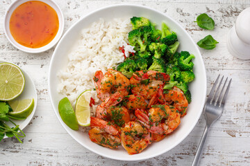 bowl with rice, grilled shrimps and broccoli