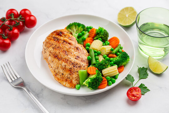 grilled  chicken breast with cooked  vegetables