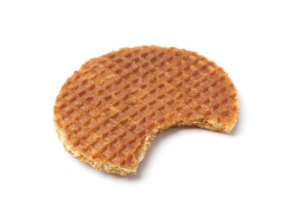 Bitten round Dutch waffle isolated on white