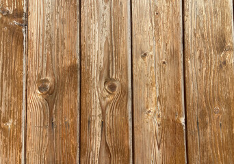 Old weathered brown wooden planks background texture for design.