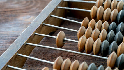 Vintage wooden brushes on a wooden background