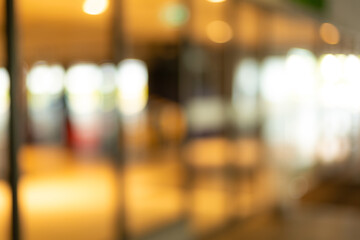 Background, texture, blurred background inside the shopping mall,Background concept, pattern bokeh bright image at room, store, cafe, for use as a background design.